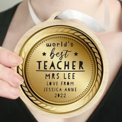 Personalised 'World's Best Teacher' Round Wooden Medal><noscript><img width=